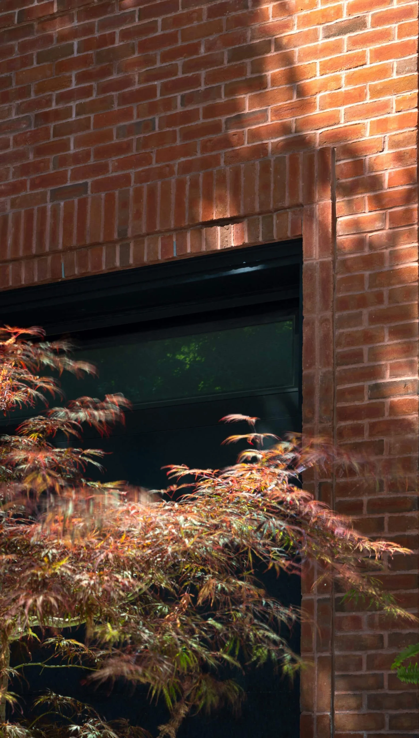 Brownstone brick and garden detail, view two