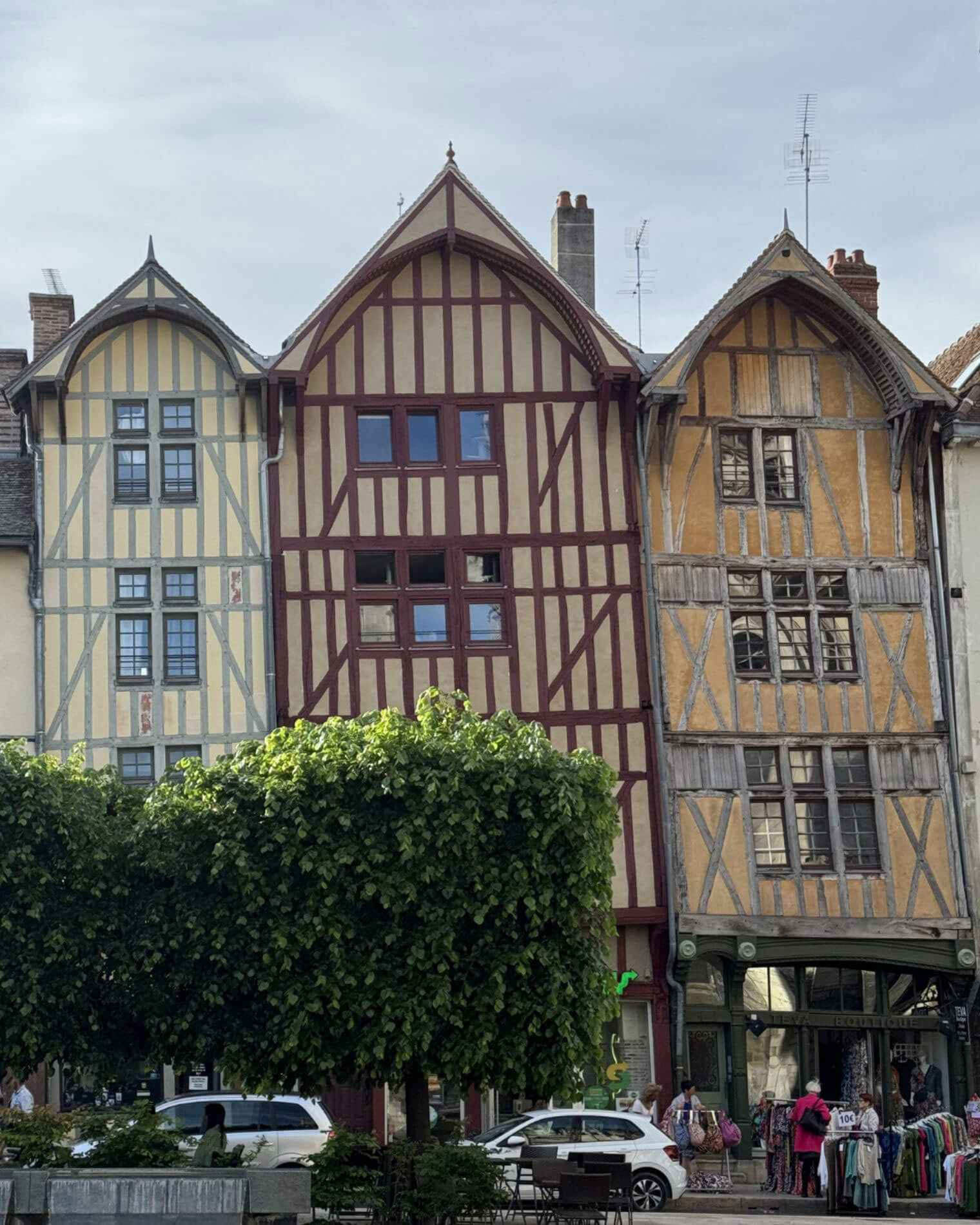 Colourful gabled timber-framed facades around a square