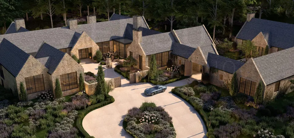 Aerial view of a mountain compound arranged around a landscaped courtyard